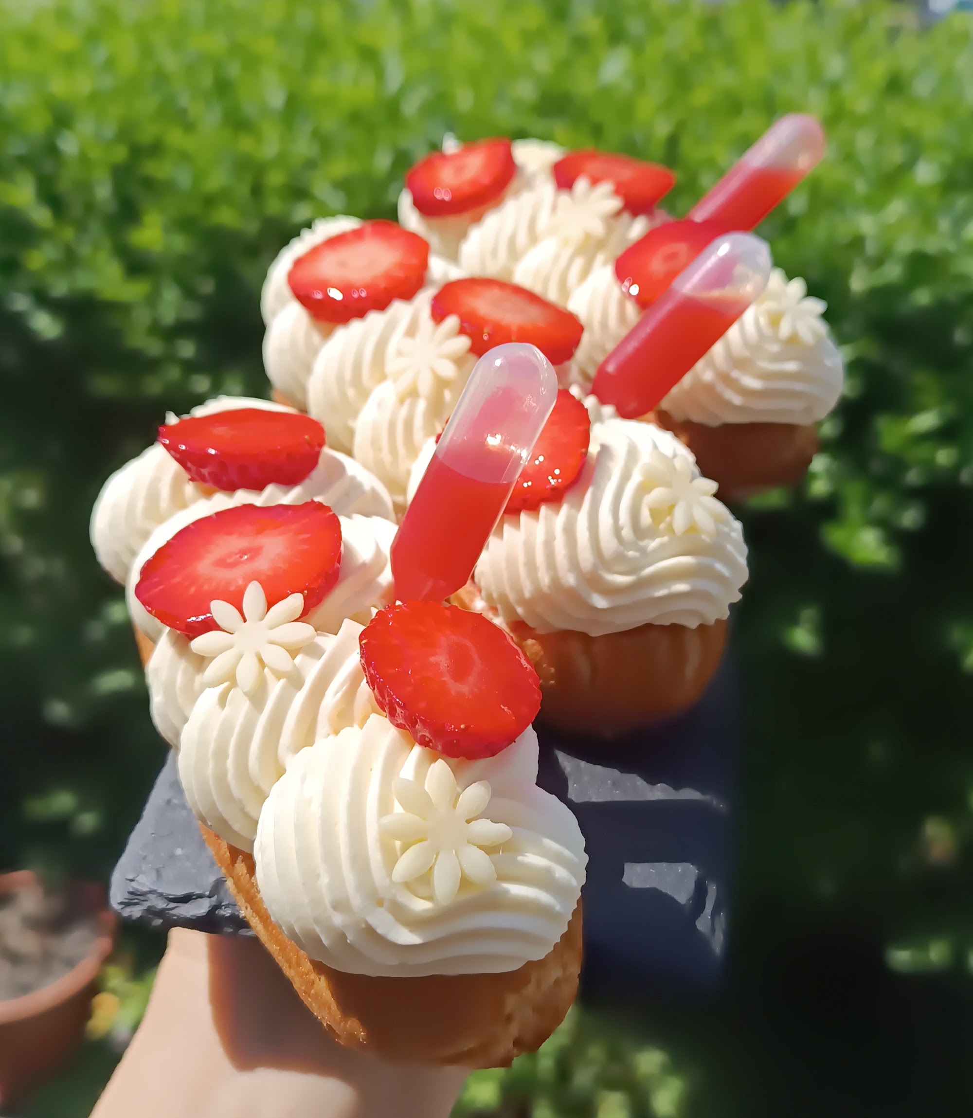 Individual pastry finished with berries, cream and crisp decorative elements