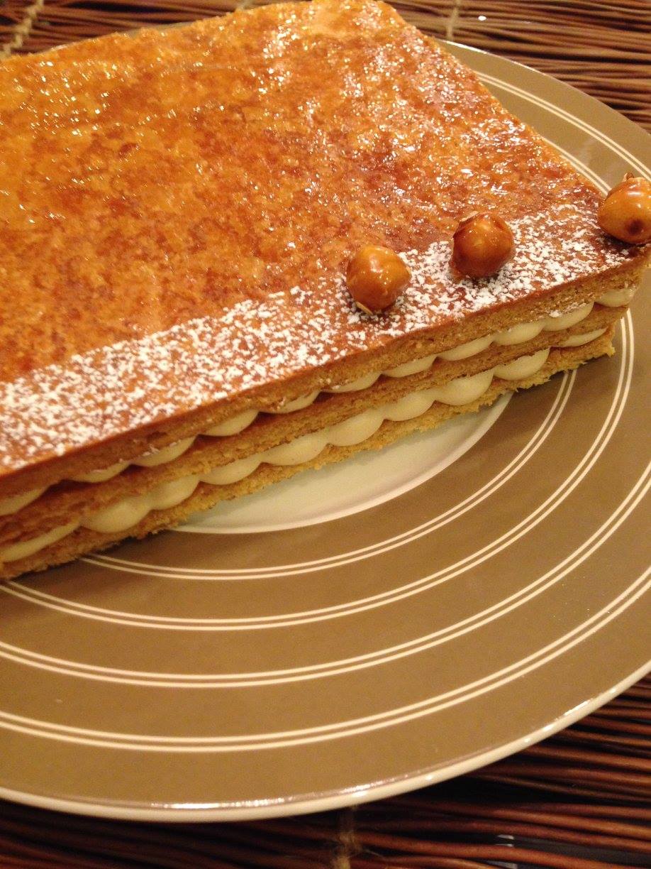 Rectangular caramelised mille-feuille with vanilla cream and glazed hazelnuts