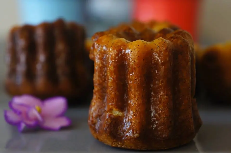 Classic baked canelés with dark caramelised fluted shells