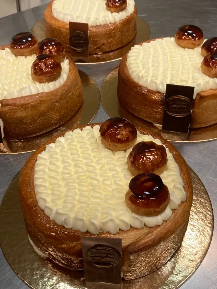 Round Saint-Honoré-style pastries with choux, caramel and piped cream