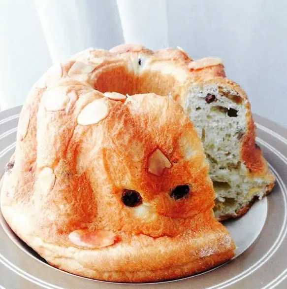 Sliced Kugelhopf with raisins distributed through an enriched crumb